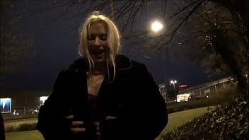 Blonde british babe flashing at night and showing tits downtown